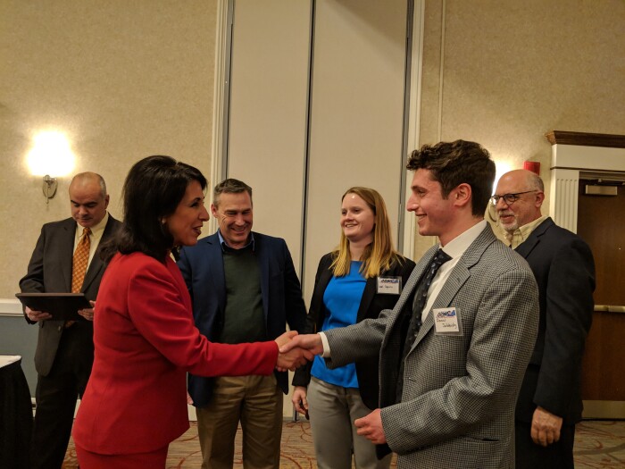 County Executive Cheryl Dinolfo accepts the “Project of the Year Award” from the Genesee Valley Branch of the New York State Chapter of the American Public Works Association